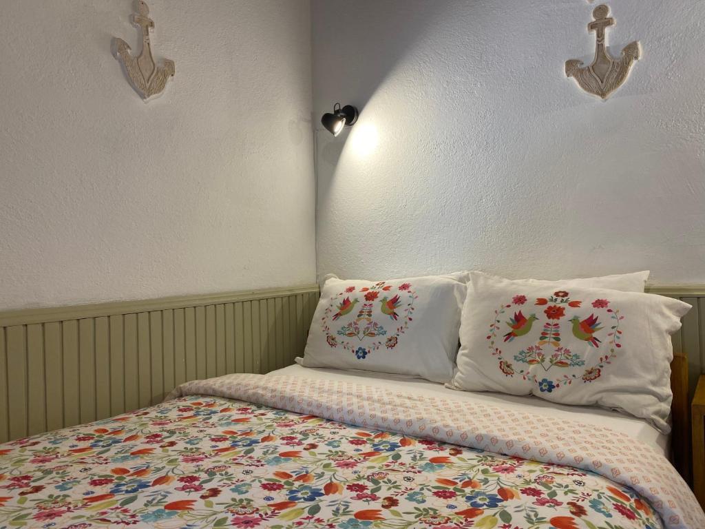 A bed or beds in a room at Mystic Konak