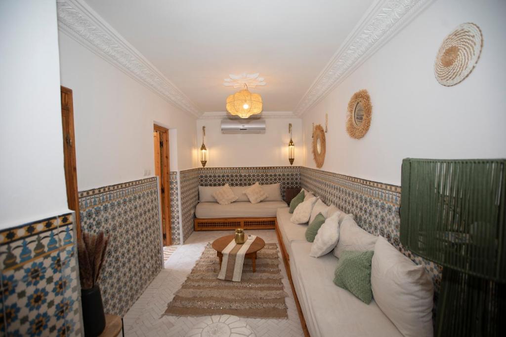 Coin salon dans l'établissement Riad Näjma privatisation, 2 Bassins