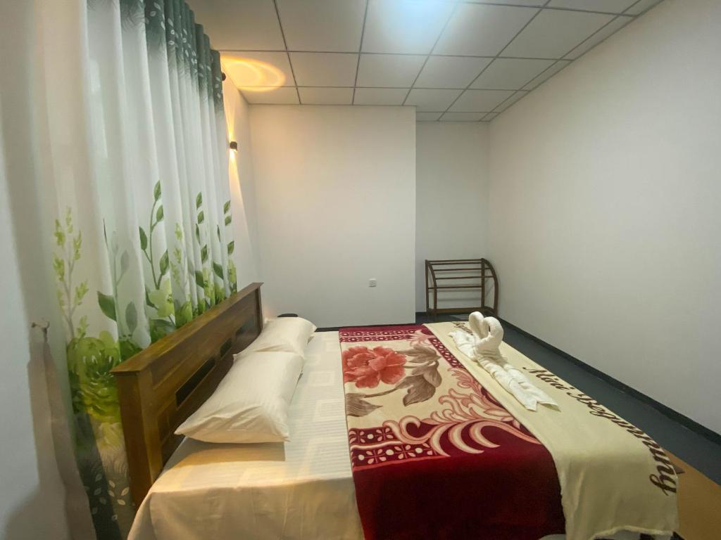 Postel nebo postele na pokoji v ubytování S and D Home Stay