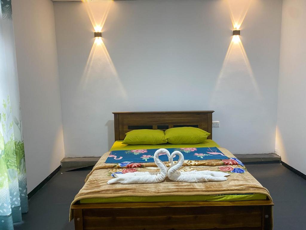 Postel nebo postele na pokoji v ubytování S and D Home Stay