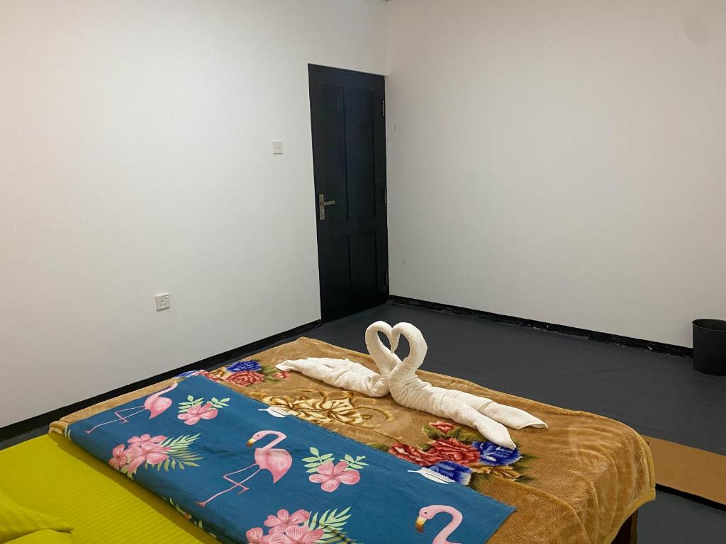 Postel nebo postele na pokoji v ubytování S and D Home Stay