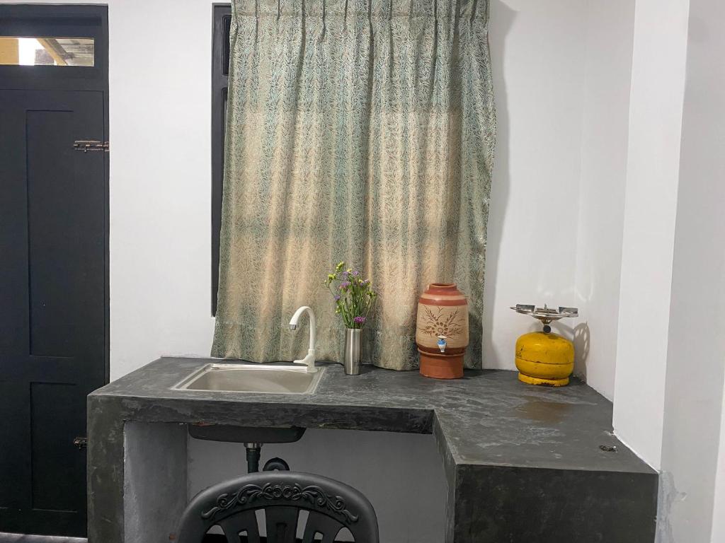 Kuchyň nebo kuchyňský kout v ubytování S and D Home Stay