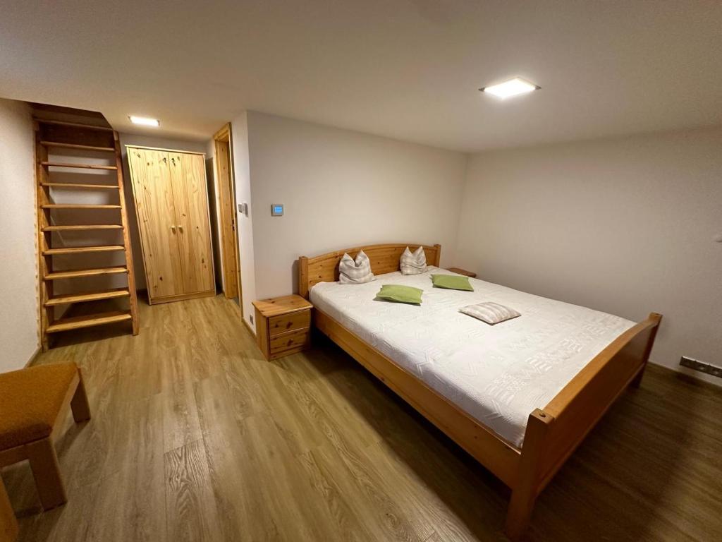 Postel nebo postele na pokoji v ubytování Chalet Galla
