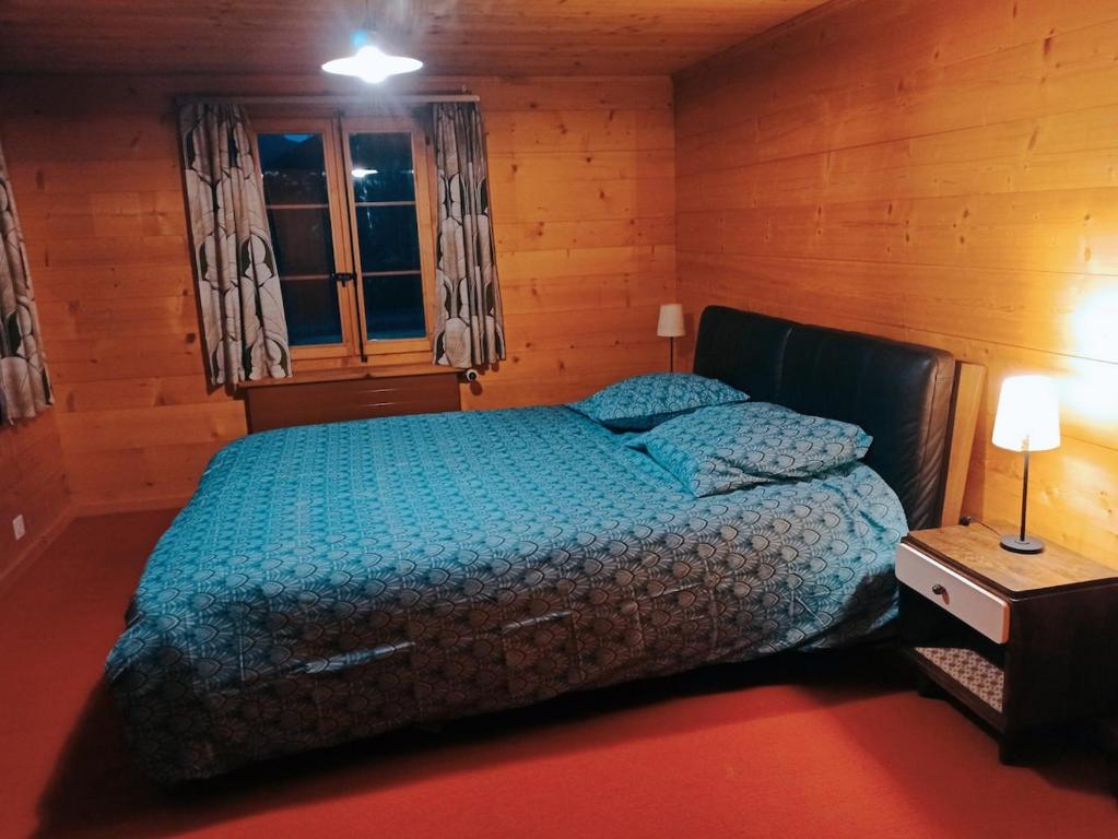 Postel nebo postele na pokoji v ubytování Chalet le Muveran