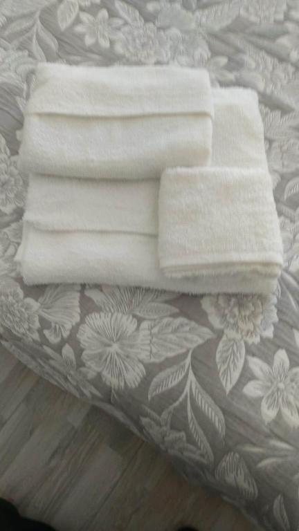 Łóżko lub łóżka w pokoju w obiekcie Sicilia Beddra