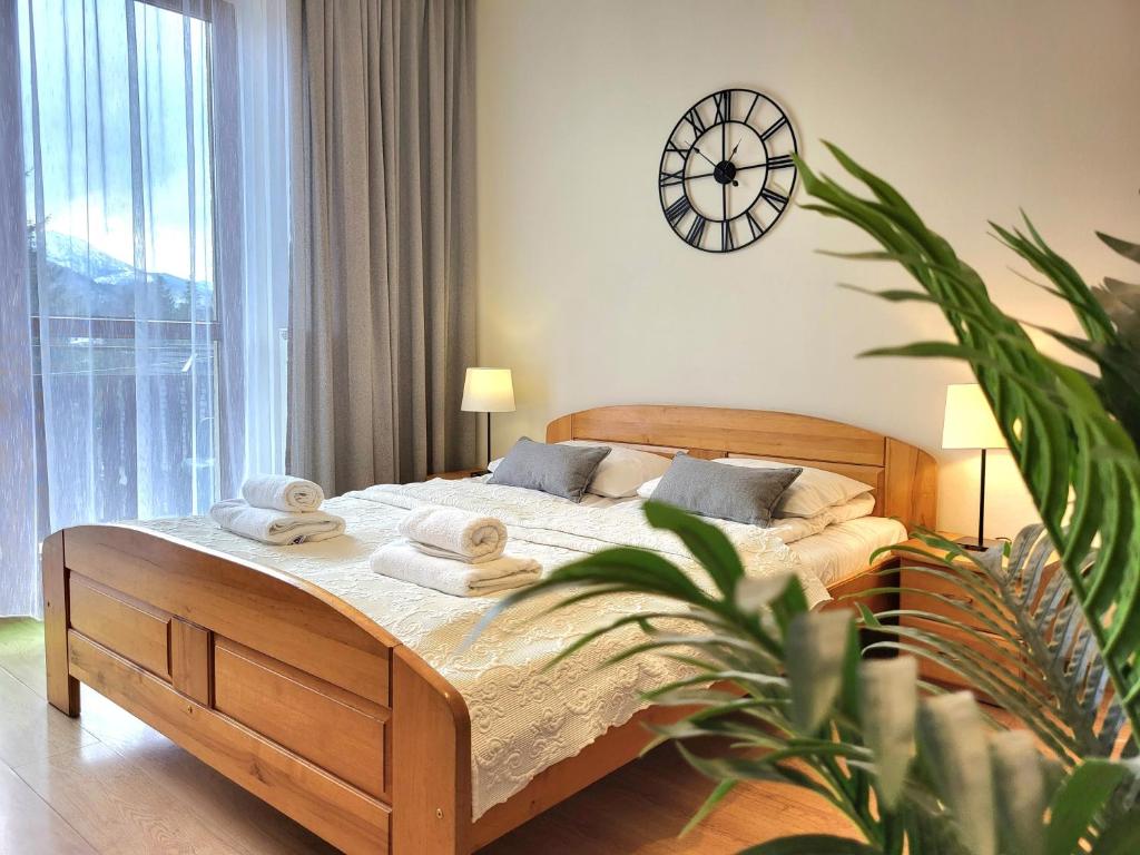 Posteľ alebo postele v izbe v ubytovaní Apartamenty Velvet
