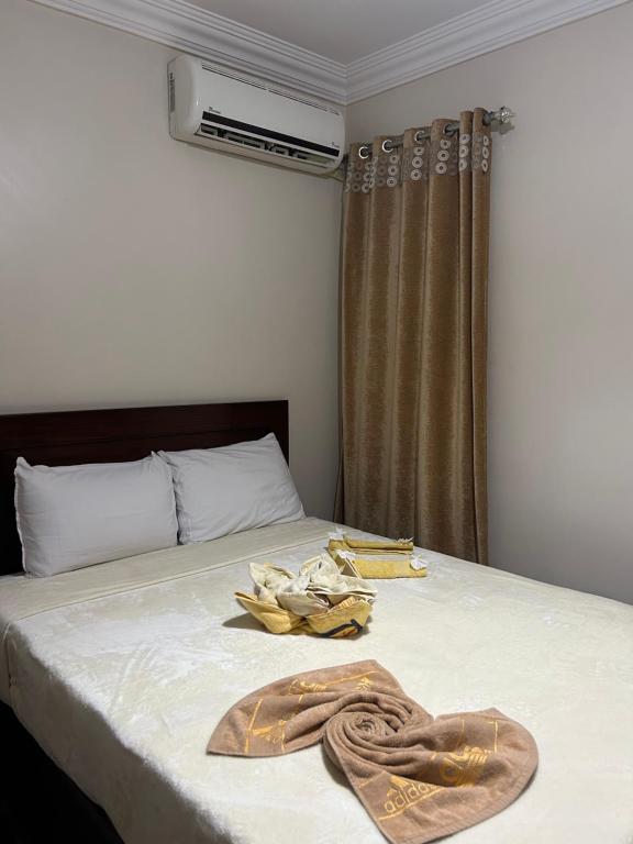 Letto o letti in una camera di Isis Guest House