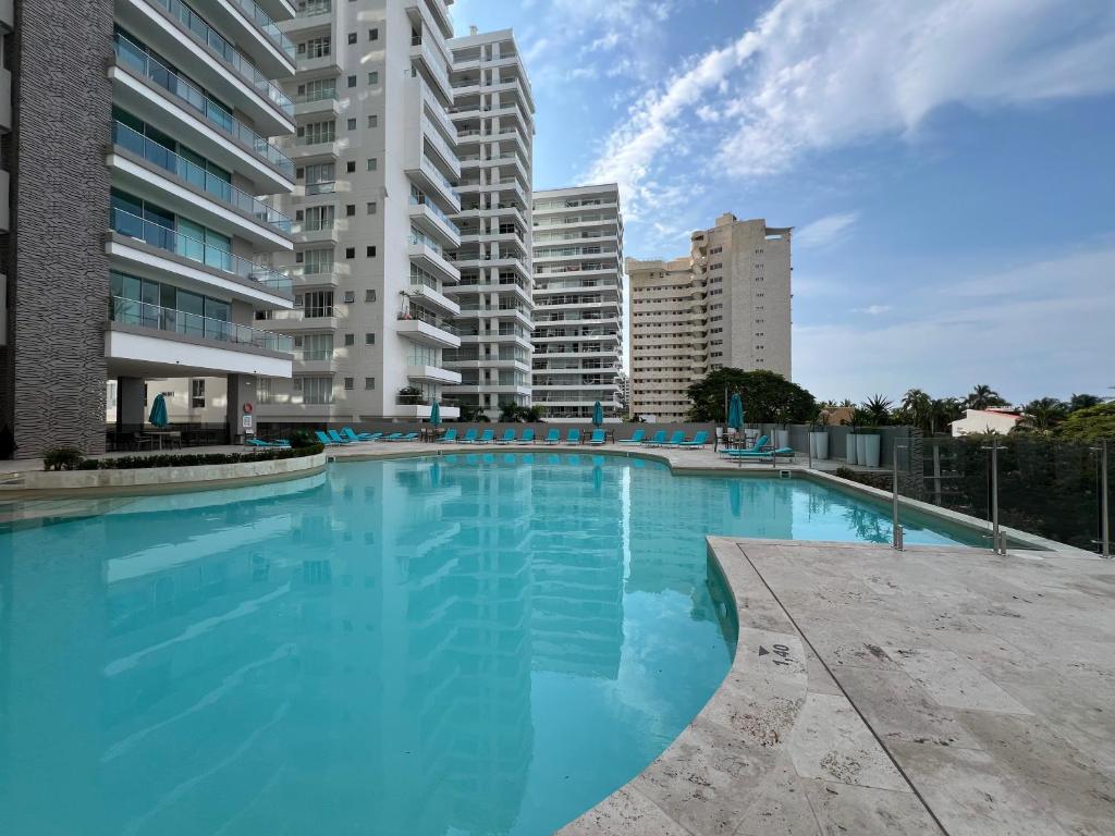 Πισίνα στο ή κοντά στο Edificio Süi Loft - Bello Horizonte