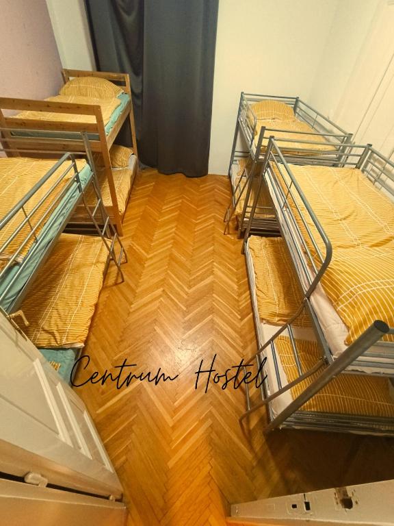 Postel nebo postele na pokoji v ubytování Centrum Hostel