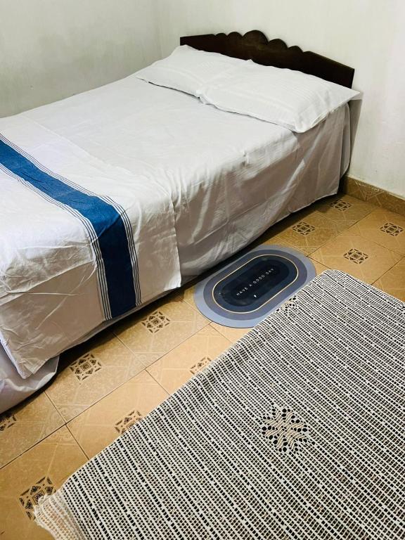 Postel nebo postele na pokoji v ubytování Meeyan Ella Rest