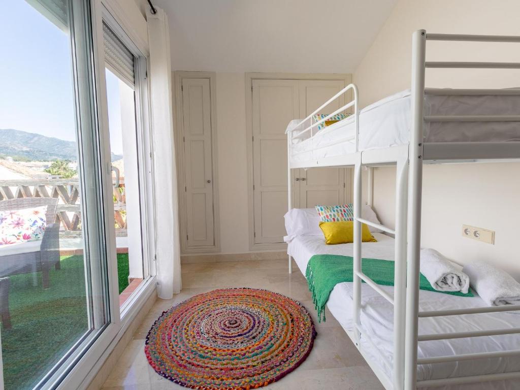 Posteľ alebo postele v izbe v ubytovaní VACATION MARBELLA I Las Canas Beachfront Haven, Sea View, Jacuzzi, Golden Mile, Duplex Penthouse, 24-7 security
