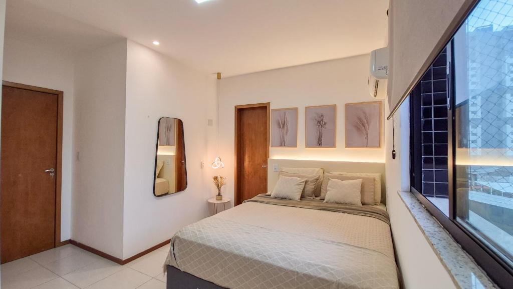Postel nebo postele na pokoji v ubytování Ap 3Q, elegante e funcional, com estacionamento