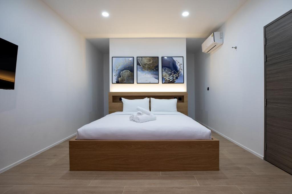 Mango Hill Residenceにあるベッド