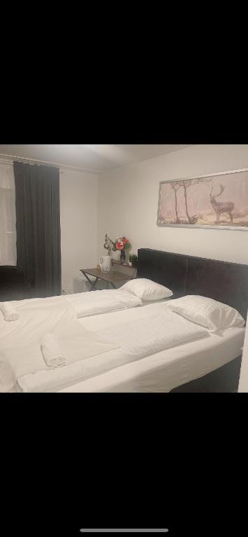 Postel nebo postele na pokoji v ubytování Hotel Hecht