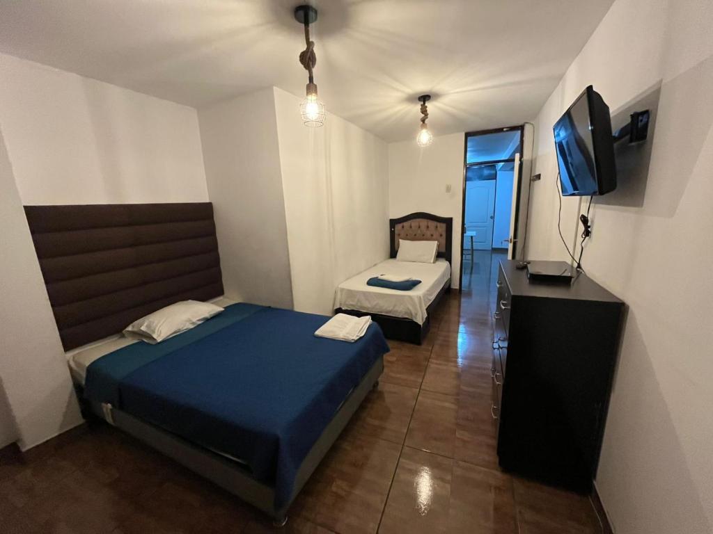 Postel nebo postele na pokoji v ubytování Home Blessed