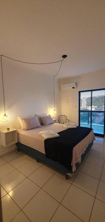 Postel nebo postele na pokoji v ubytování Apartamento com Estilo e Qualidade em Ipatinga