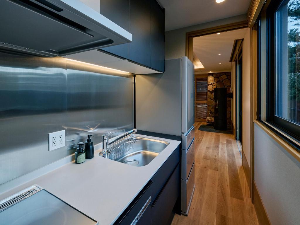 Kuchyň nebo kuchyňský kout v ubytování Glamdy style hotel suite 山ノ麓