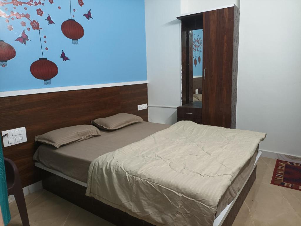 Ένα ή περισσότερα κρεβάτια σε δωμάτιο στο Banashree Guest inn