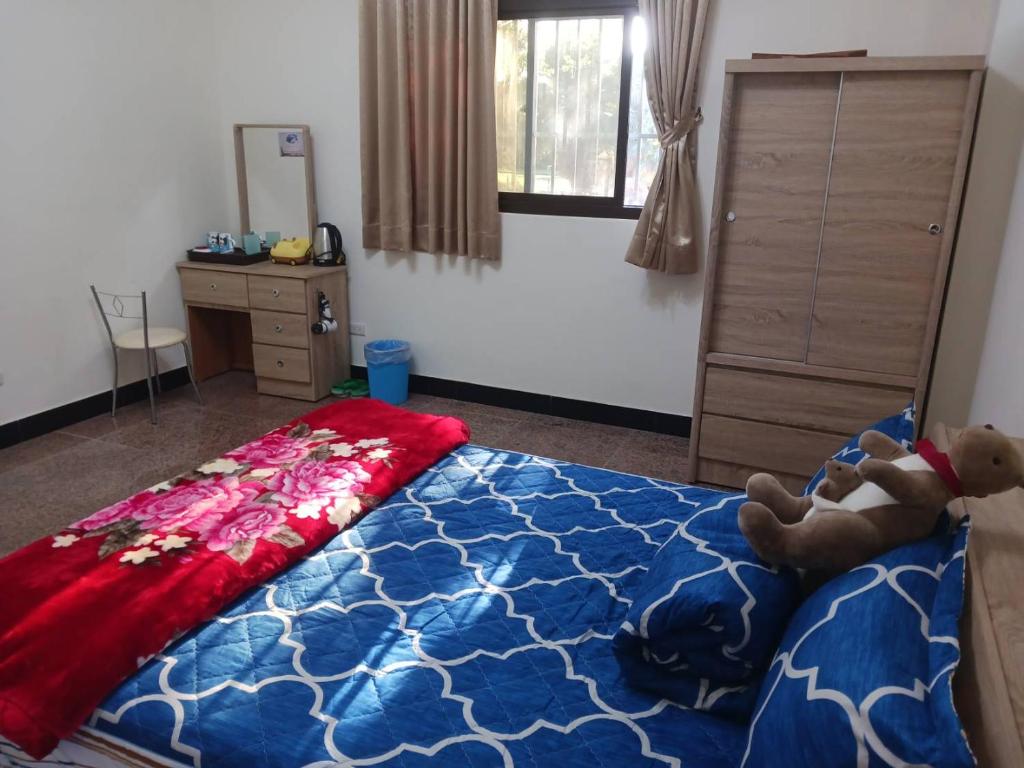 Giường trong phòng chung tại Kinmen 988 Homestay