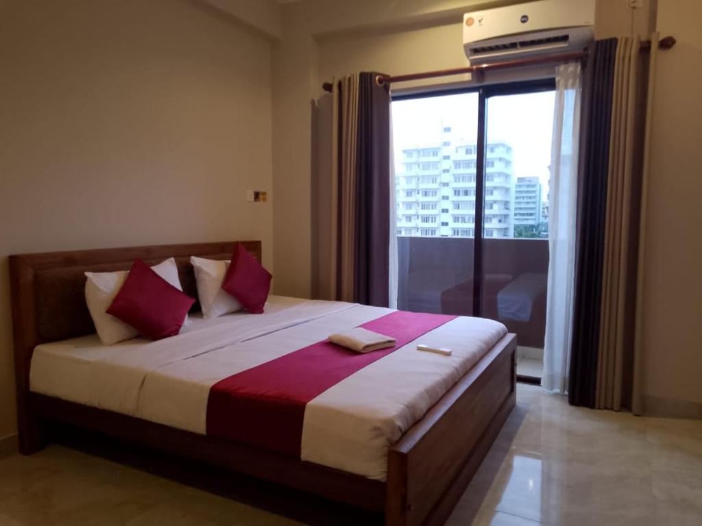 Ένα ή περισσότερα κρεβάτια σε δωμάτιο στο MercuryFM 112 House - 32 Vivekananda Road Colombo-06 -4-4