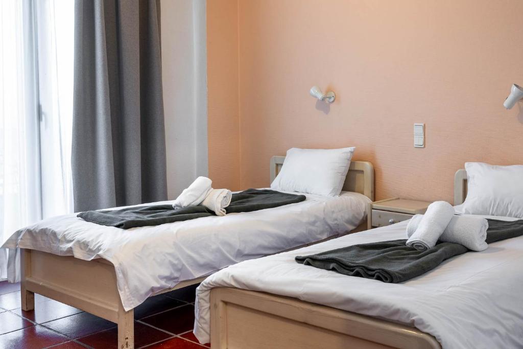 Postel nebo postele na pokoji v ubytování Scala Hotel