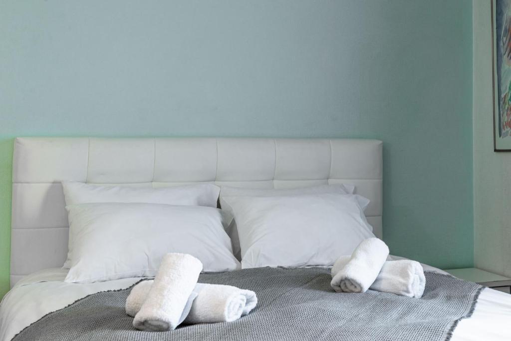 Postel nebo postele na pokoji v ubytování Scala Hotel