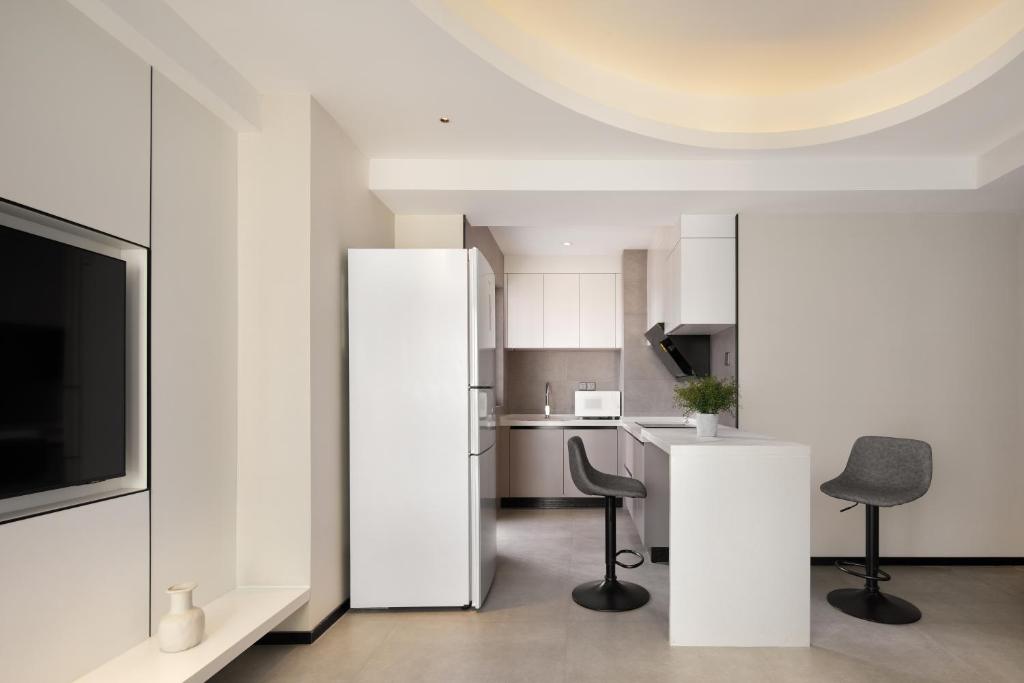 Televisor o centre d'entreteniment de Dayu Apartment Century City Branch