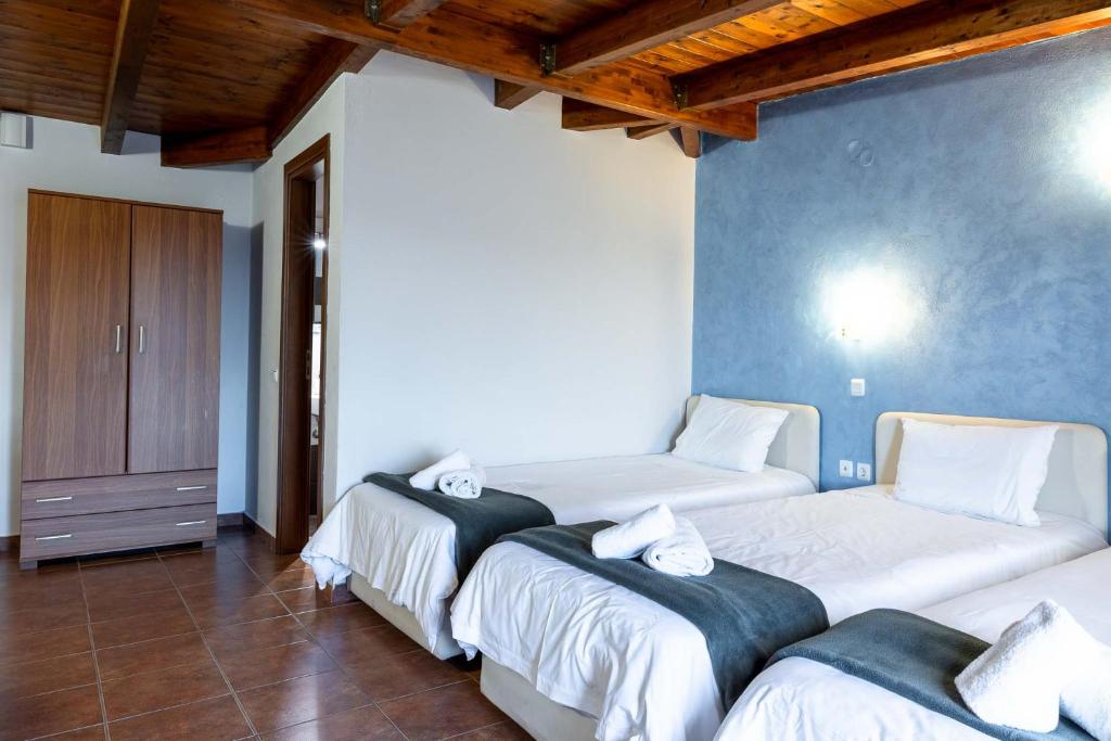 Postel nebo postele na pokoji v ubytování Scala Hotel
