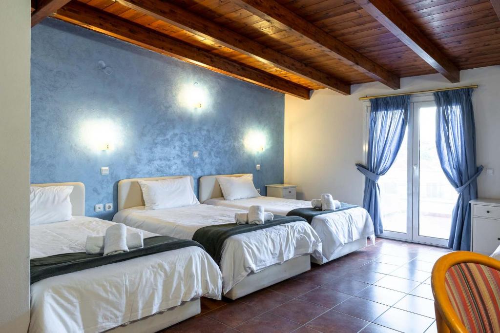Postel nebo postele na pokoji v ubytování Scala Hotel