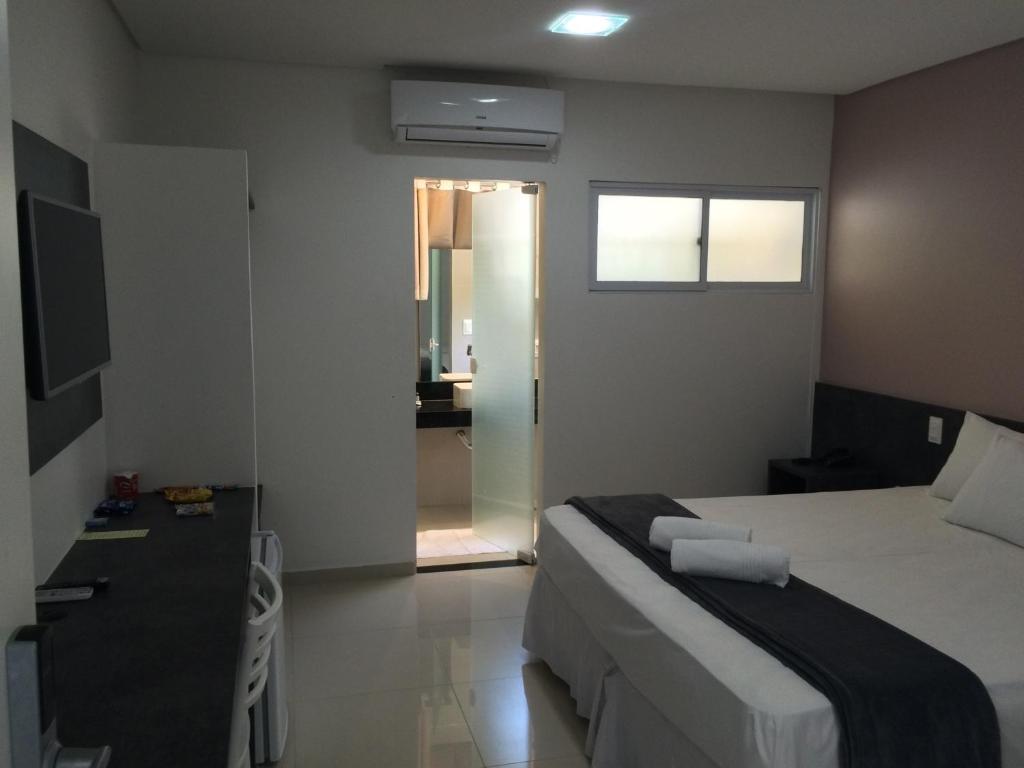 Cama ou camas em um quarto em Scenarium Hotel
