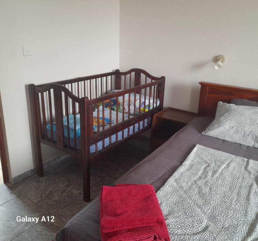 Postel nebo postele na pokoji v ubytování SLG Villa Hikkaduwa