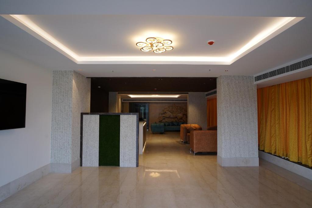 TV a/nebo společenská místnost v ubytování Hotel Sastha Grand