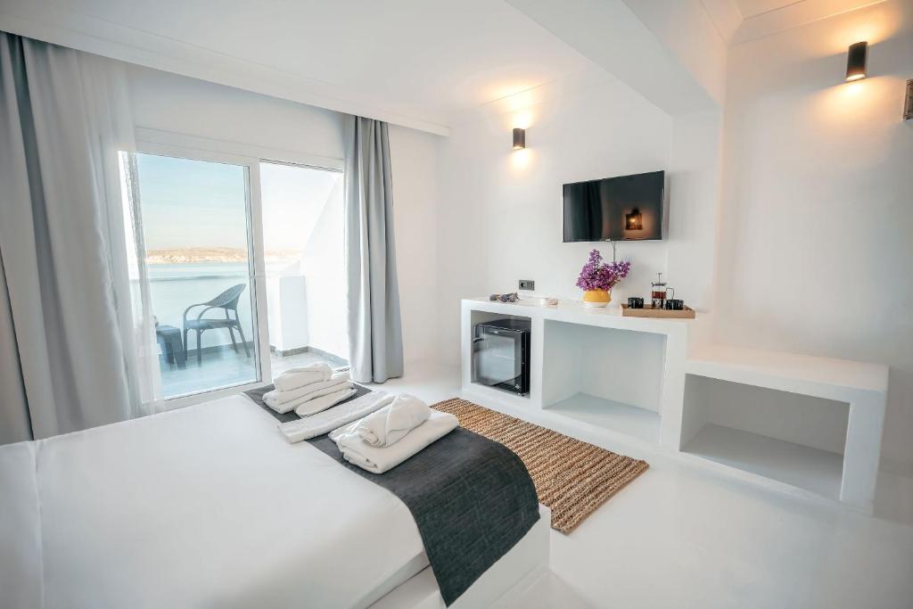 Postel nebo postele na pokoji v ubytování Çamlık 87 Hotel Ayvalık