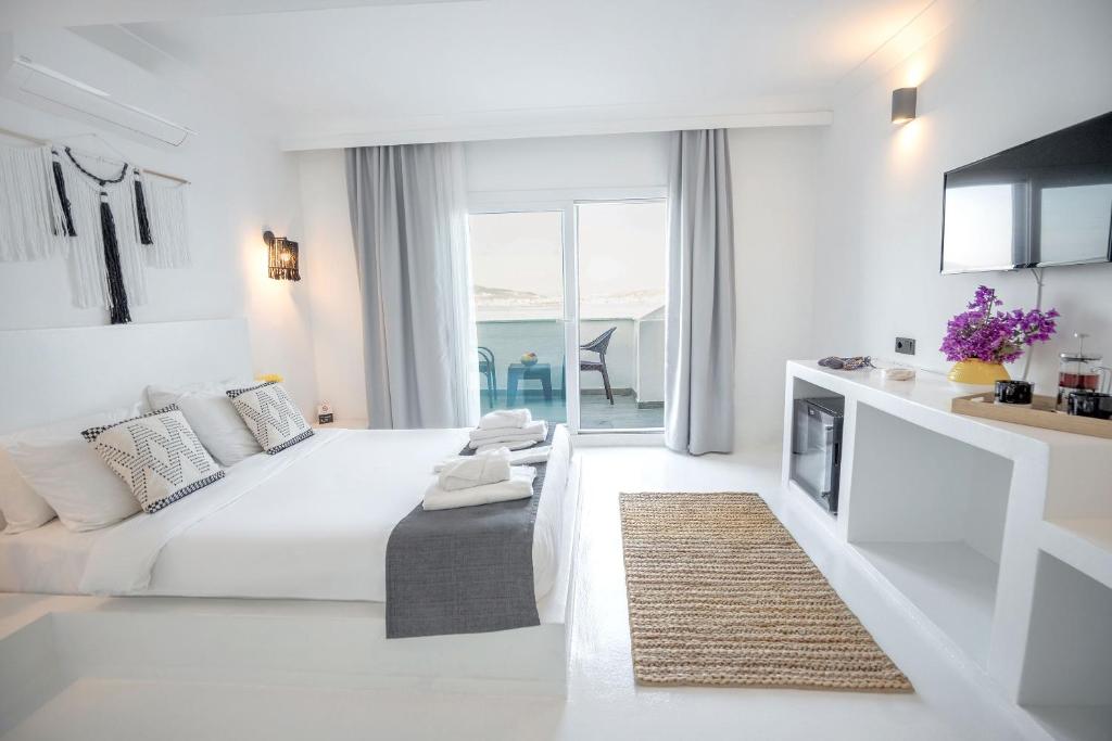Postel nebo postele na pokoji v ubytování Çamlık 87 Hotel Ayvalık
