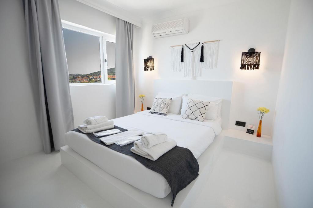 Postel nebo postele na pokoji v ubytování Çamlık 87 Hotel Ayvalık