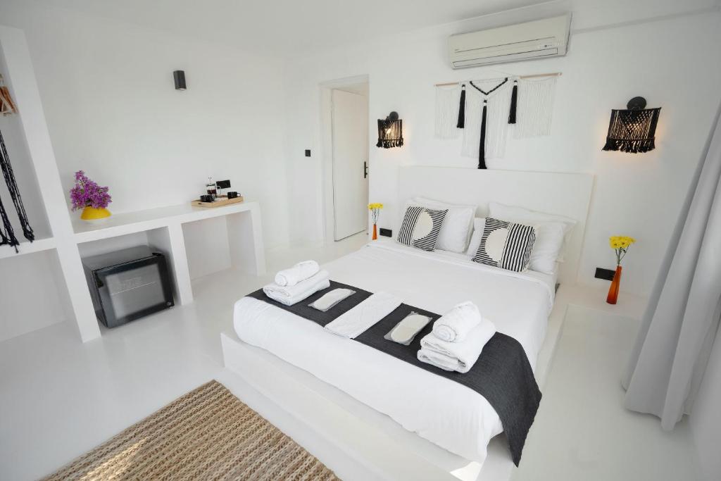 Postel nebo postele na pokoji v ubytování Çamlık 87 Hotel Ayvalık