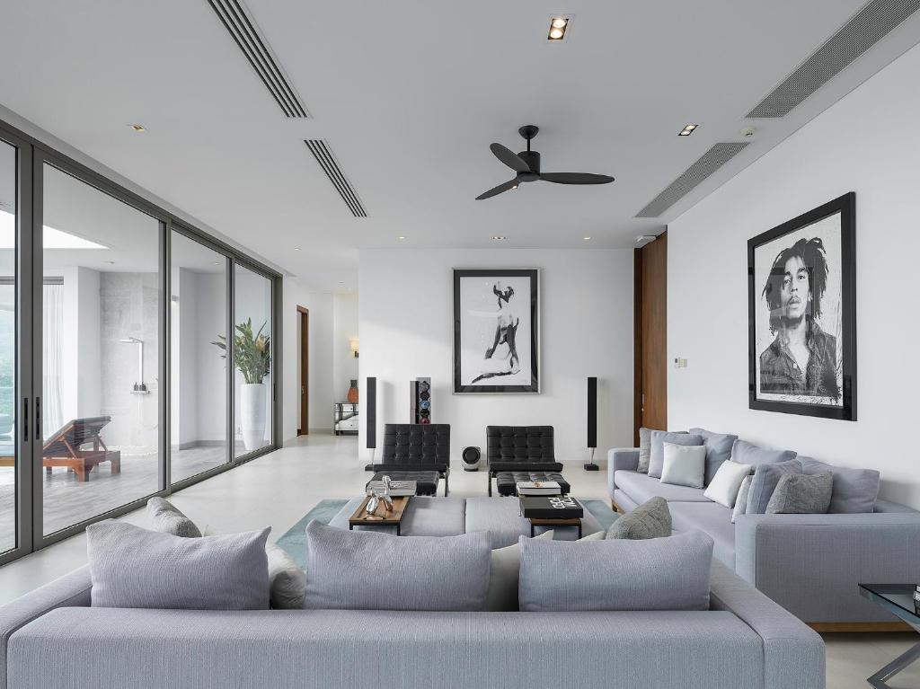 Ein Sitzbereich in der Unterkunft Malaiwana Residences