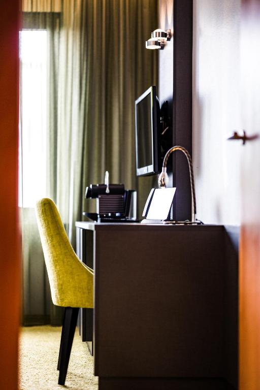 TV a/nebo společenská místnost v ubytování Hotel Der Blaue Reiter