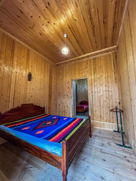 Postel nebo postele na pokoji v ubytování Gomi Riverside