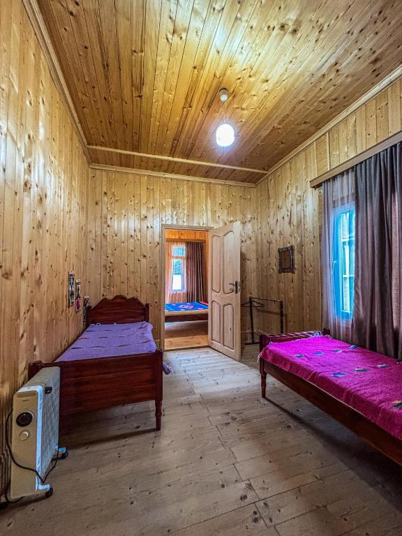 Postel nebo postele na pokoji v ubytování Gomi Riverside
