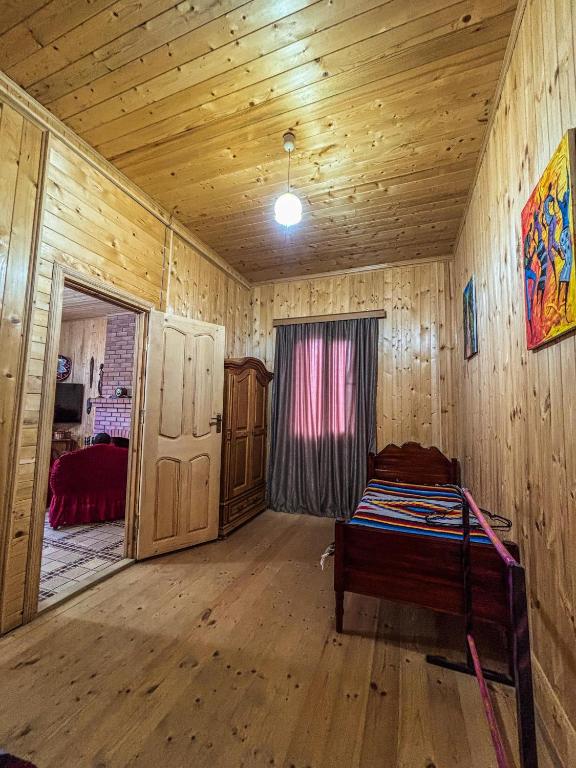 Postel nebo postele na pokoji v ubytování Gomi Riverside