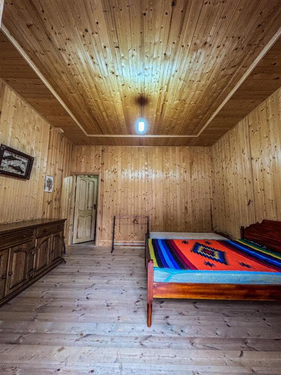 Postel nebo postele na pokoji v ubytování Gomi Riverside