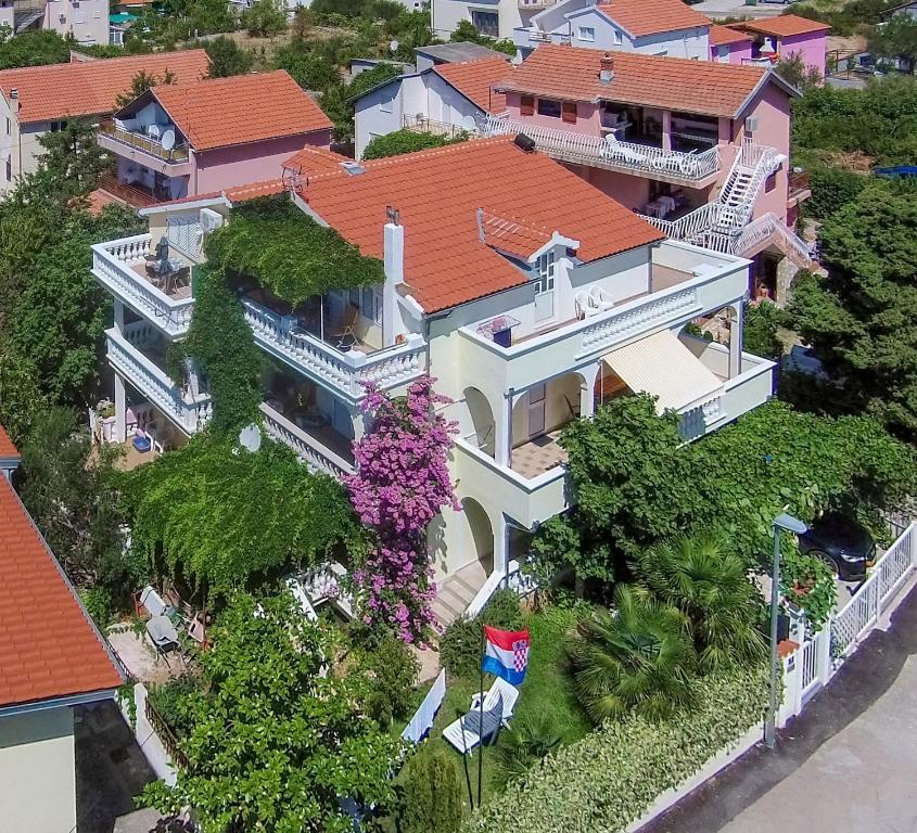 an aerial view of a large house with red roofs at Oaza Tribunj Sea View in Tribunj