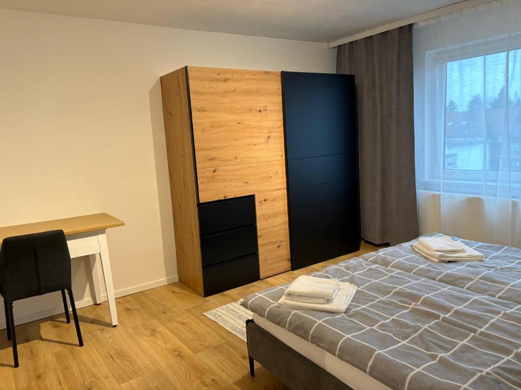 Postel nebo postele na pokoji v ubytování Gemütliches Einfamilienhaus mit Garten