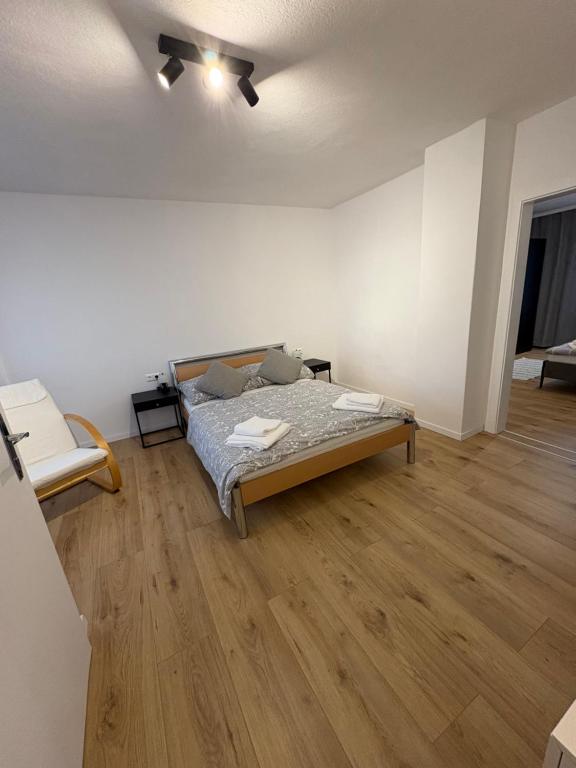 Postel nebo postele na pokoji v ubytování Gemütliches Einfamilienhaus mit Garten