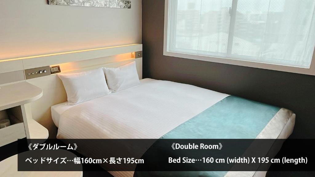 Postel nebo postele na pokoji v ubytování Urban Hotel Kyoto Shijo Premium