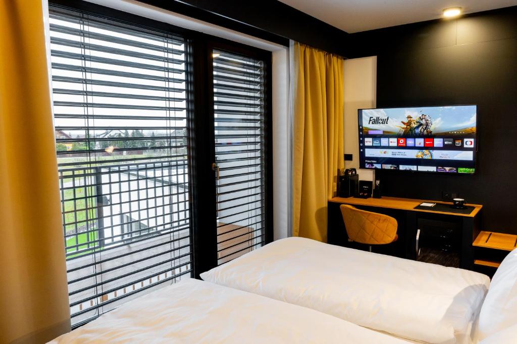 TV a/nebo společenská místnost v ubytování Hotel NOBILIS - Mladá Boleslav