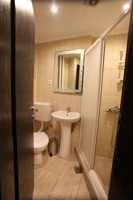 Koupelna v ubytování Hotel Petrus