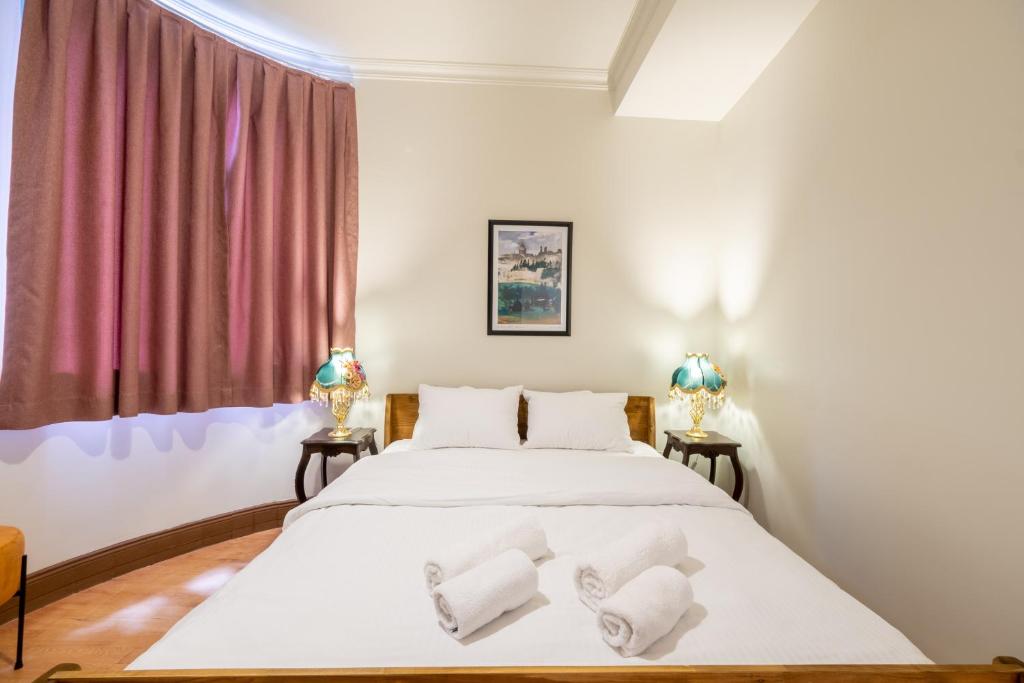 Postel nebo postele na pokoji v ubytování Mayer Taksim Apartments