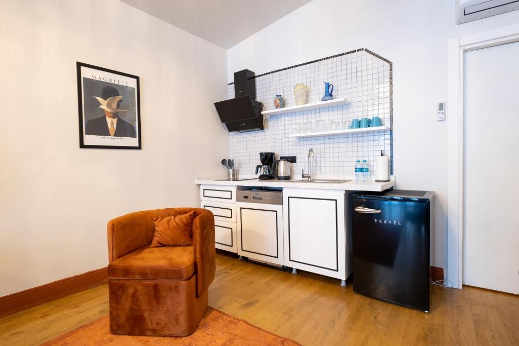 Kuchyň nebo kuchyňský kout v ubytování Mayer Taksim Apartments